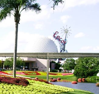 Epcot's gardens with Spaceship Earth in the background.